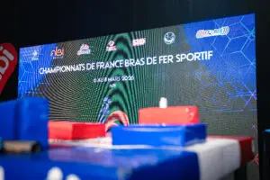 Athlètes du club de bras de fer X-MEN lors des Championnats de France de bras de fer 2026, vitrine de l’élite nationale.
